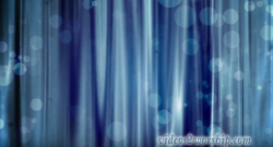 Read more about the article Blue Curtain And Bokeh Particles
