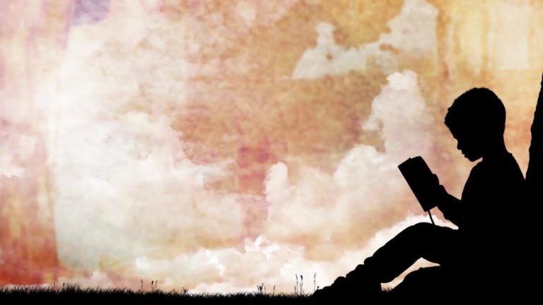 Read more about the article Child Reading The Bible And Moving Clouds